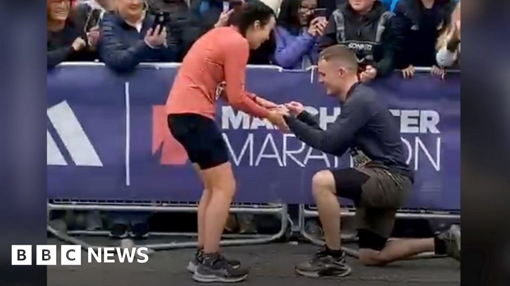 Marathon runners get engaged at finish line