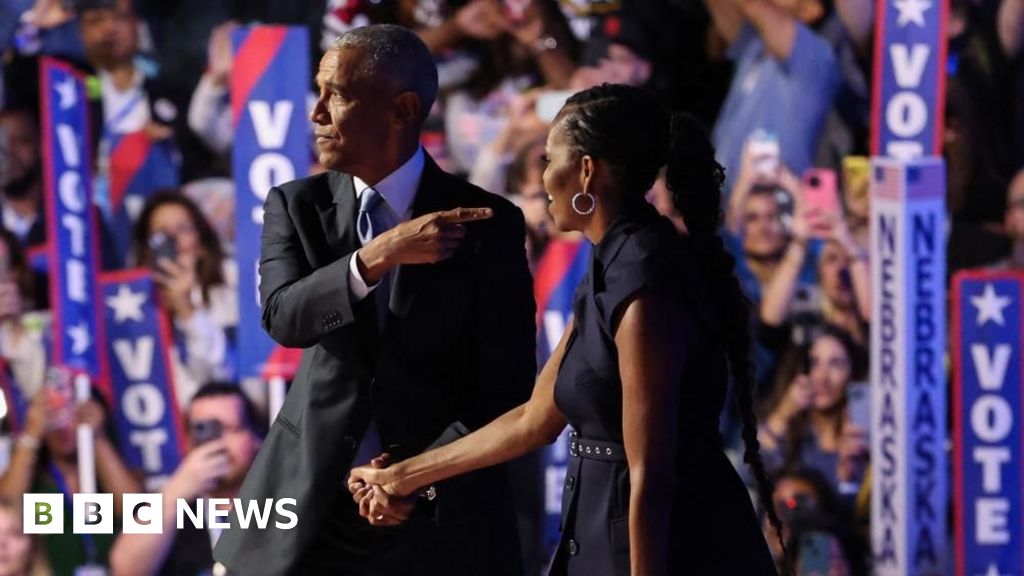 Barack and Michelle Obama electrify Democrats but warn of tight race