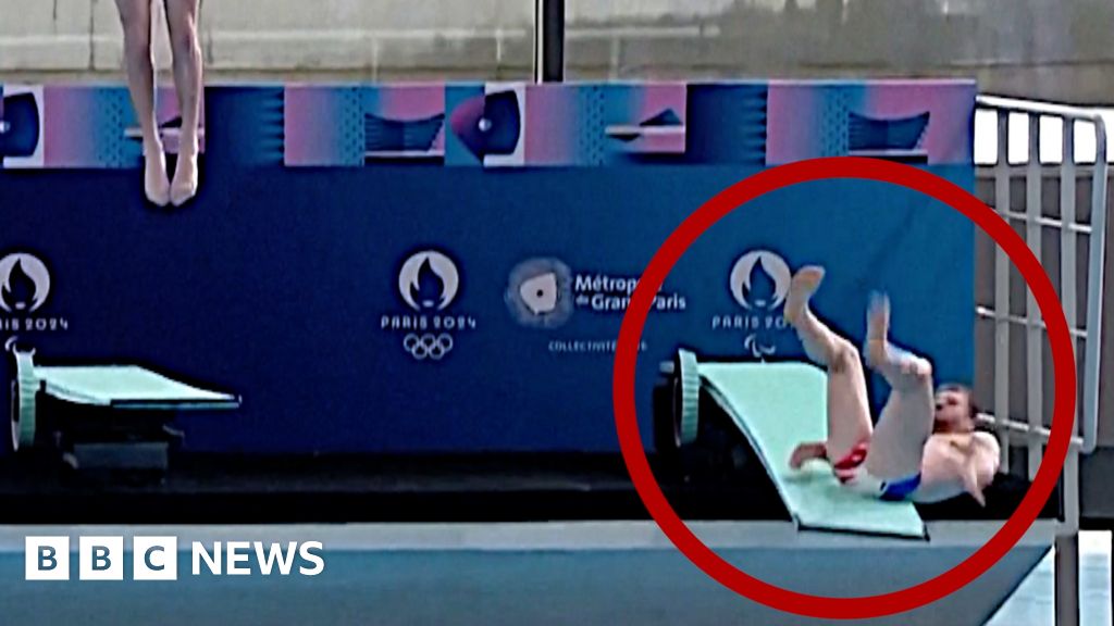 Moment diver slips during Olympic pool inauguration