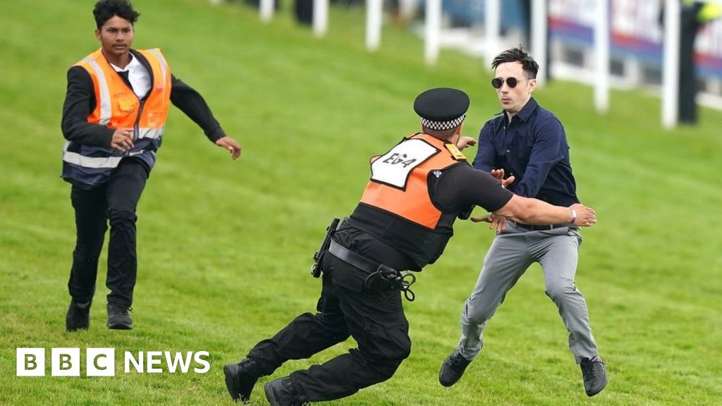 Man charged over Epsom Derby track protest