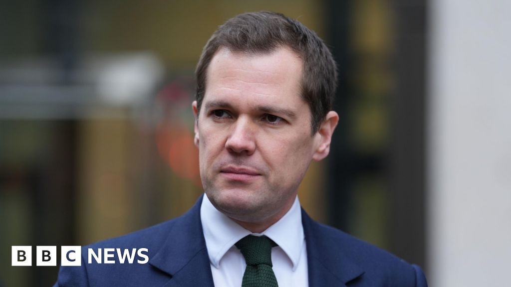 Charity boss offers Jenrick 'olive branch' over BBC row