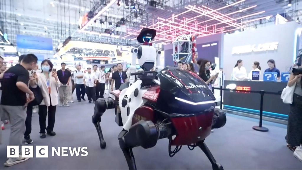 Photo: BBC A humanoid robot riding a mechanical horse in front of onlookers