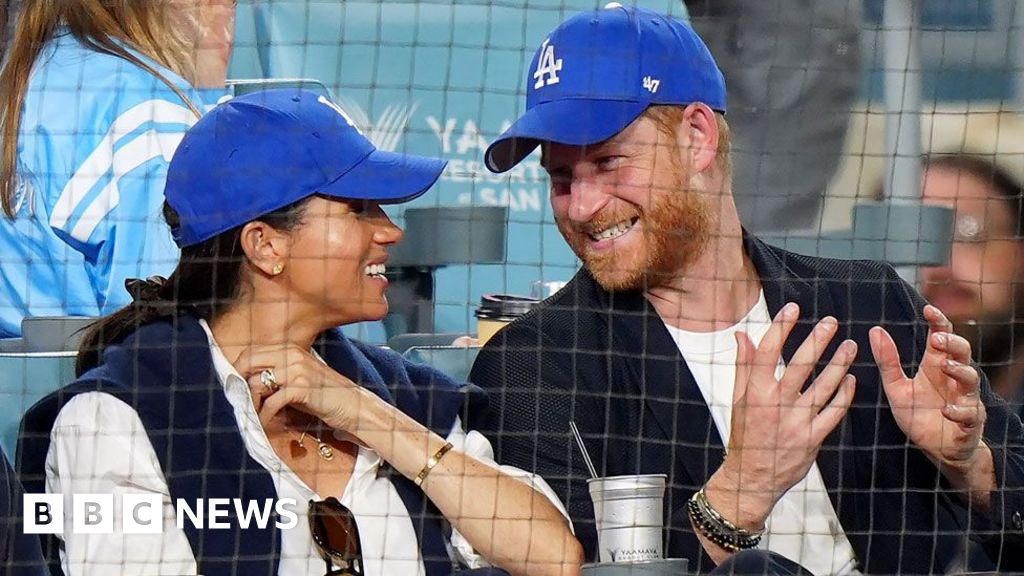 Harry jokes he was 'under duress' when he wore LA Dodgers cap during game against Canadian team