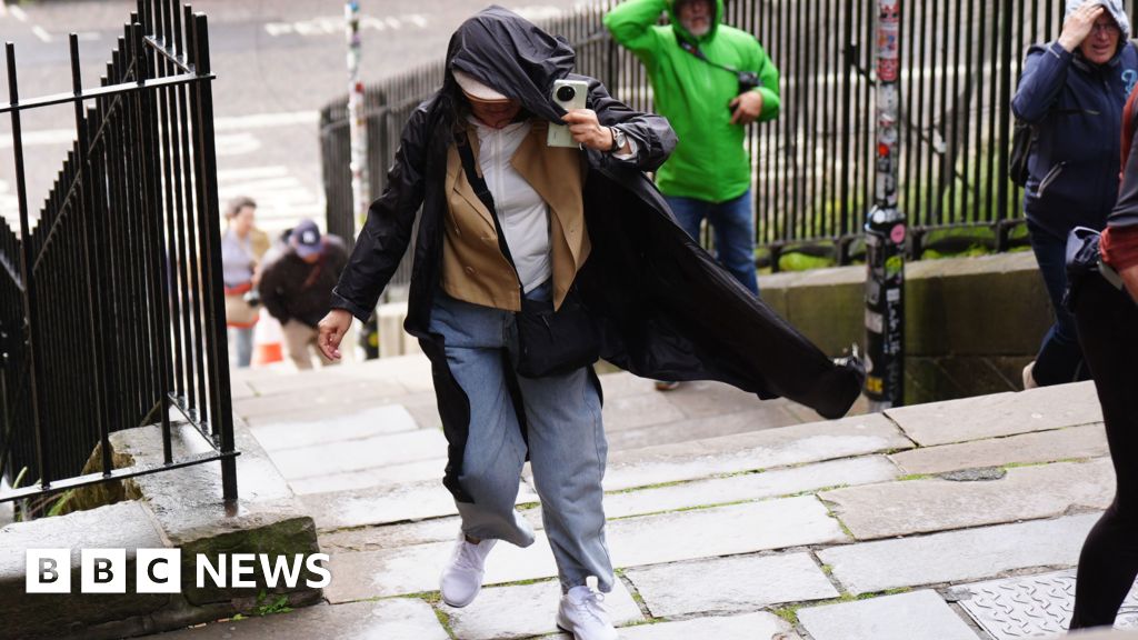Storm Floris batters UK with winds over 80mph