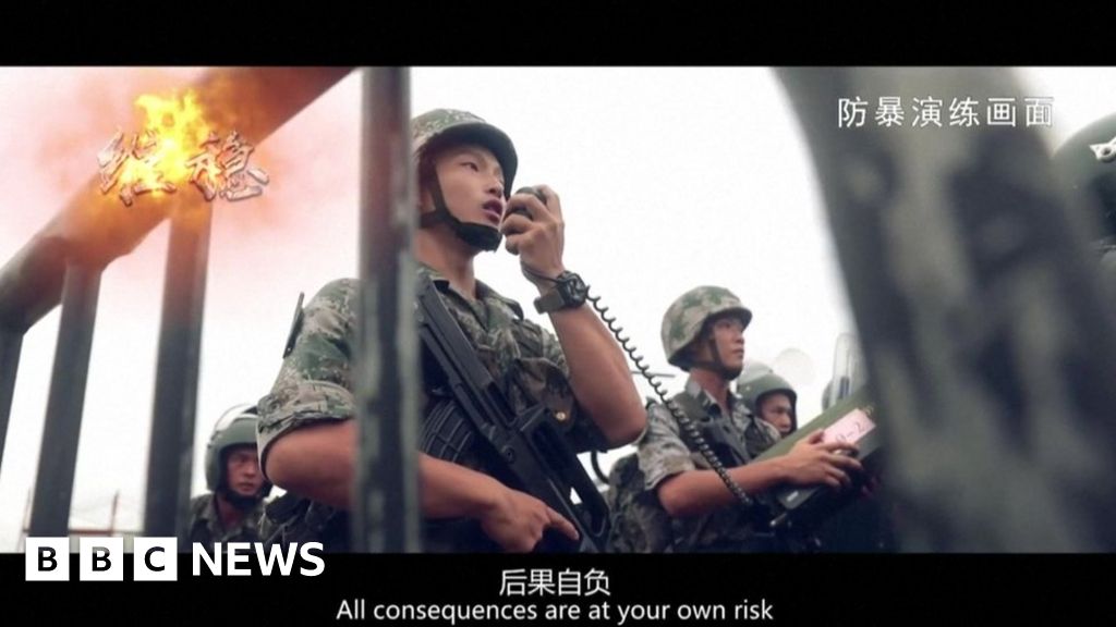 Hong Kong protests: Chinese army releases anti-riot video seen as warning