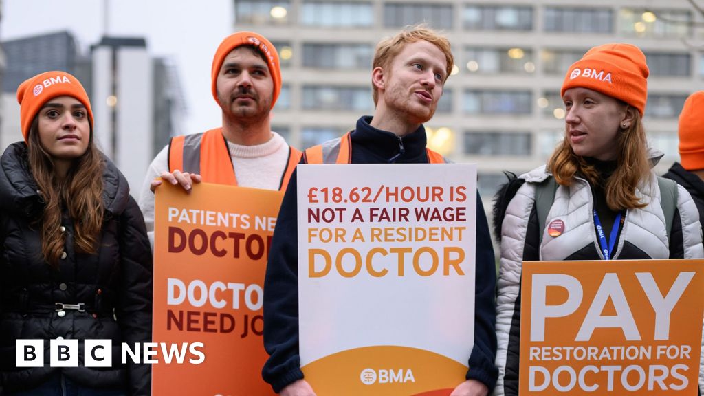 Resident doctors vote to go ahead with strike in England as hospitals battle flu wave