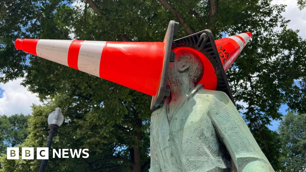 Why are Scotland fans putting traffic cones on statues in Boston?
