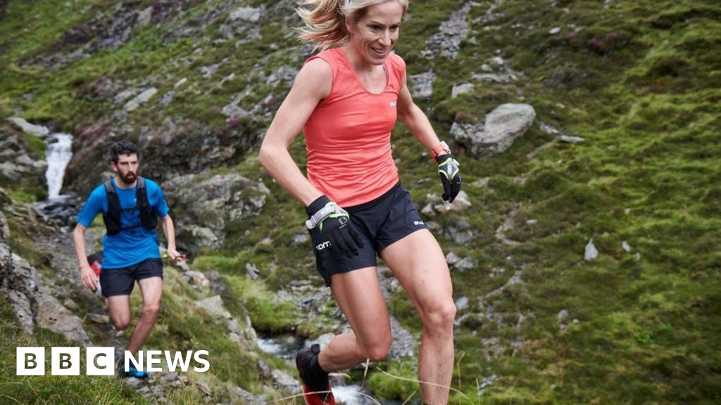 Beth Pascall running across one of the fells as part of the Bob Graham Round