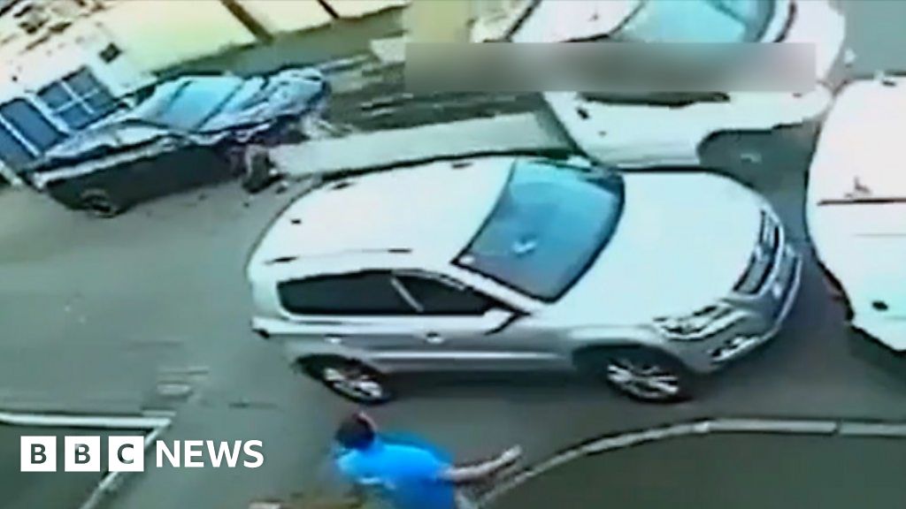 CCTV shows rogue driver wrecking police car
