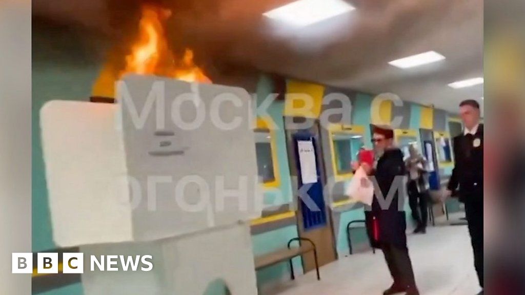 Russia election: Polling booth set on fire on voting day - BBC News