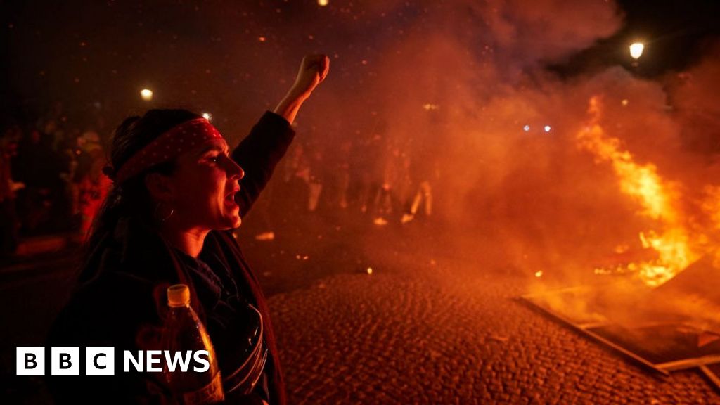 France pension protests: Crowd clashes with police over government reform by decree - BBC