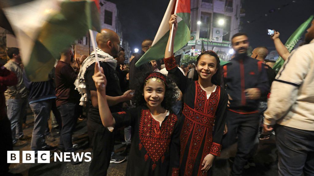 Palestinians celebrate as ceasefire begins - BBC News