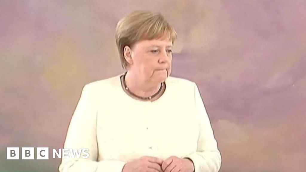 German Chancellor Angela Merkel Shakes At Berlin Ceremony - BBC News