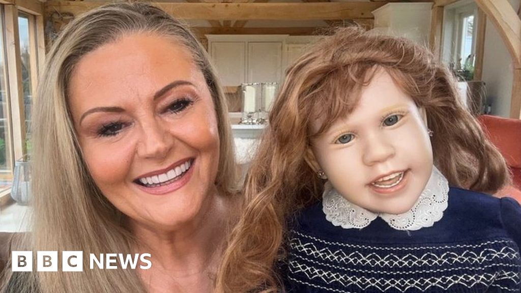 Celebrity psychic buys ‘creepy’ charity shop doll – BBC News