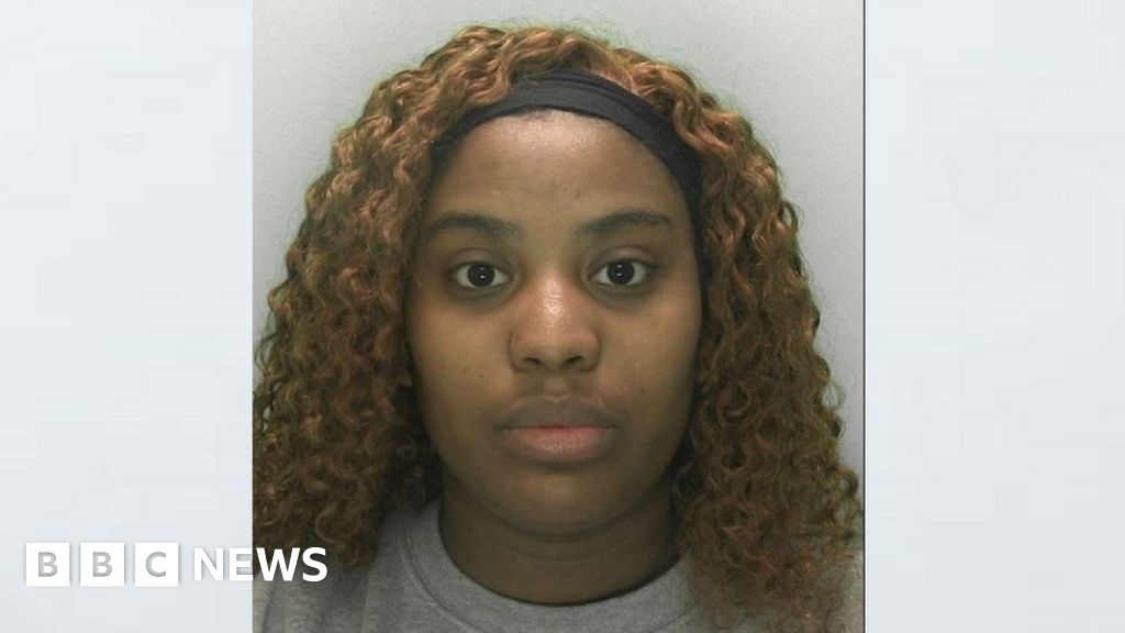 Erica Tavares looking at the camera for her custody mugshot