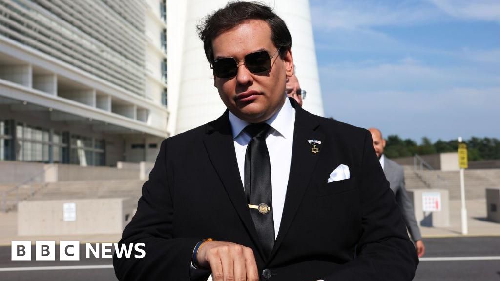 Former congressman George Santos begins seven-year prison sentence