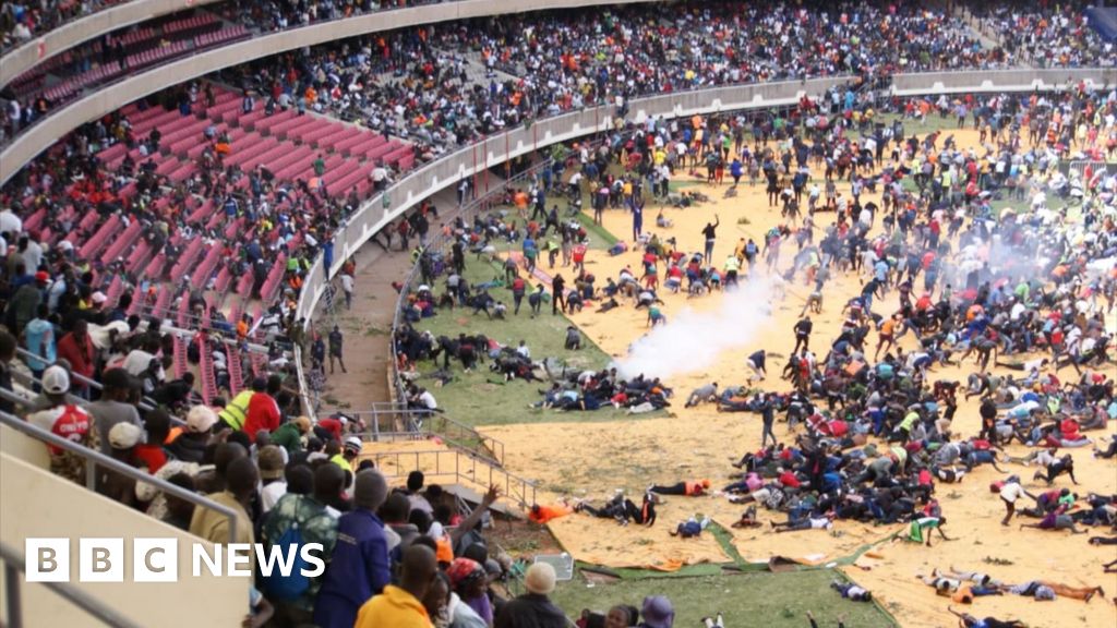 Police fire tear gas at crowds mourning former Kenyan prime minister