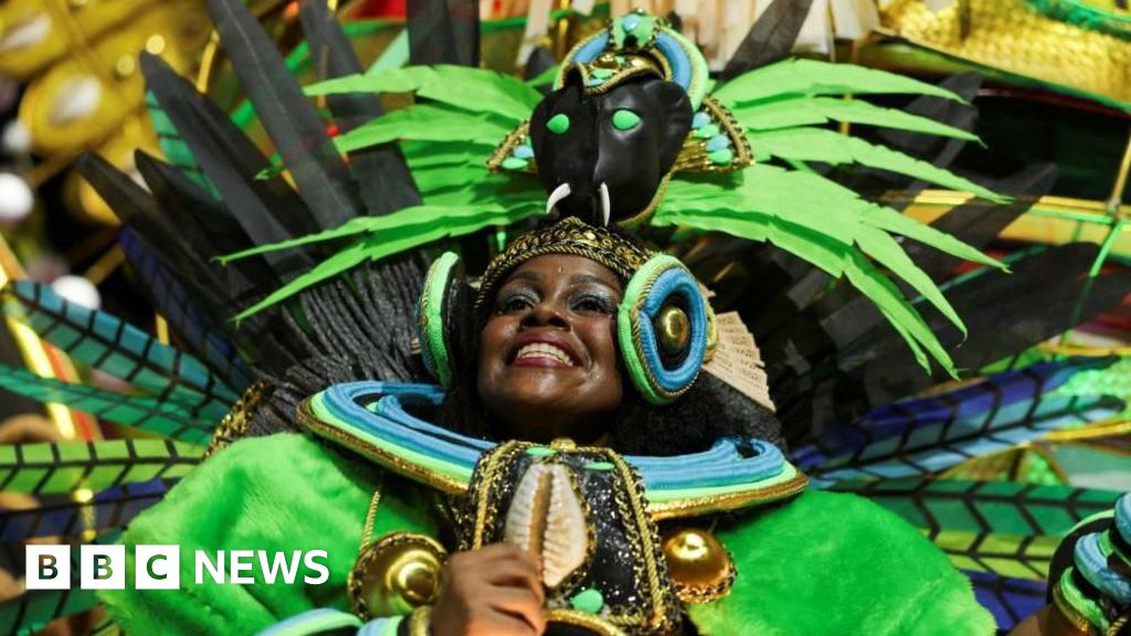 Flames, feathers and fangs: Rio Carnival parade in pictures