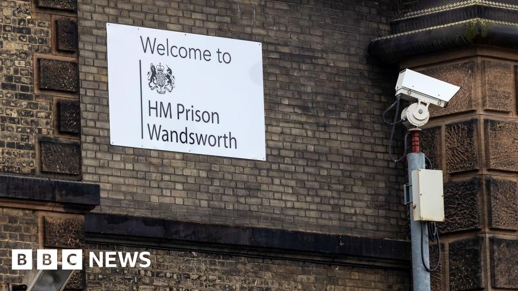 Police hunt for two men mistakenly released from prison