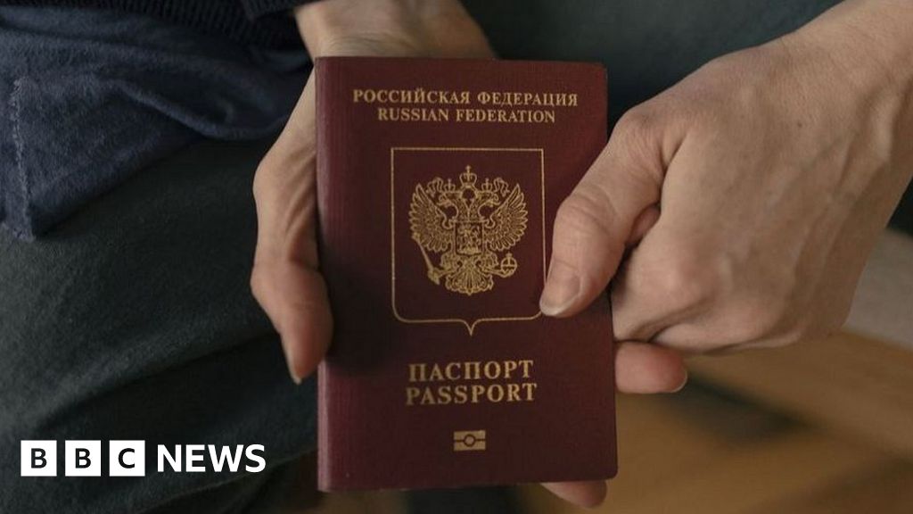 Russia hands out passports in occupied Ukraine cities