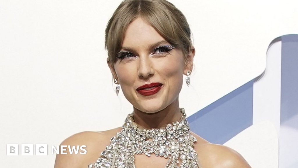 Taylor Swift makes history as she takes over the entire US top 10 – BBC