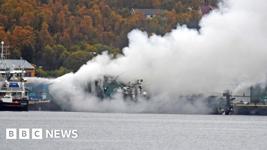 Gutted Russian trawler Bukhta Nayezdnik overturns in Norway