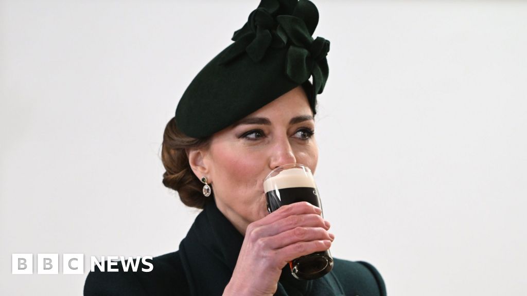 Kate drinks Guinness at St Patricks Day event