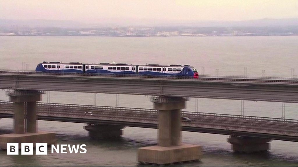 Russias Putin Takes Crimea Train Over New Rail Link