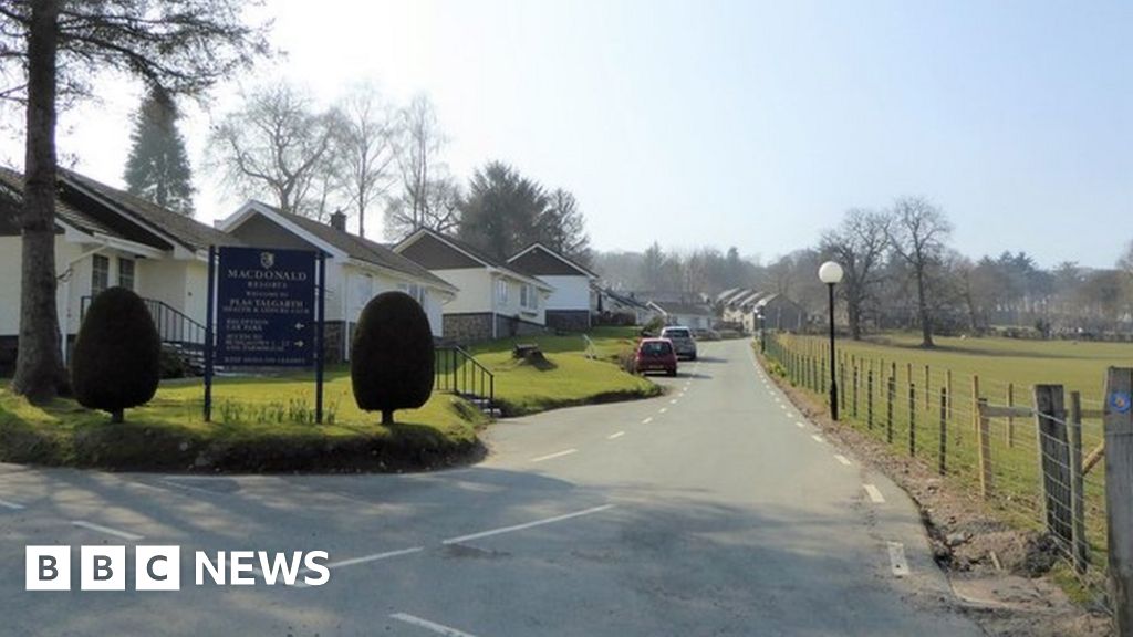 Llandudno: Woman trapped in toilet had to pay to get out - BBC News