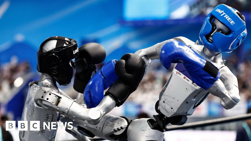 Robots sprint, box, and play football at Beijing games