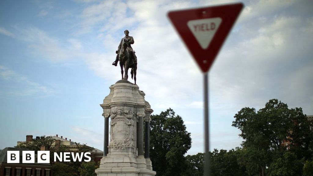 Robert E Lee statue: Virginia removes contentious memorial as crowds cheer