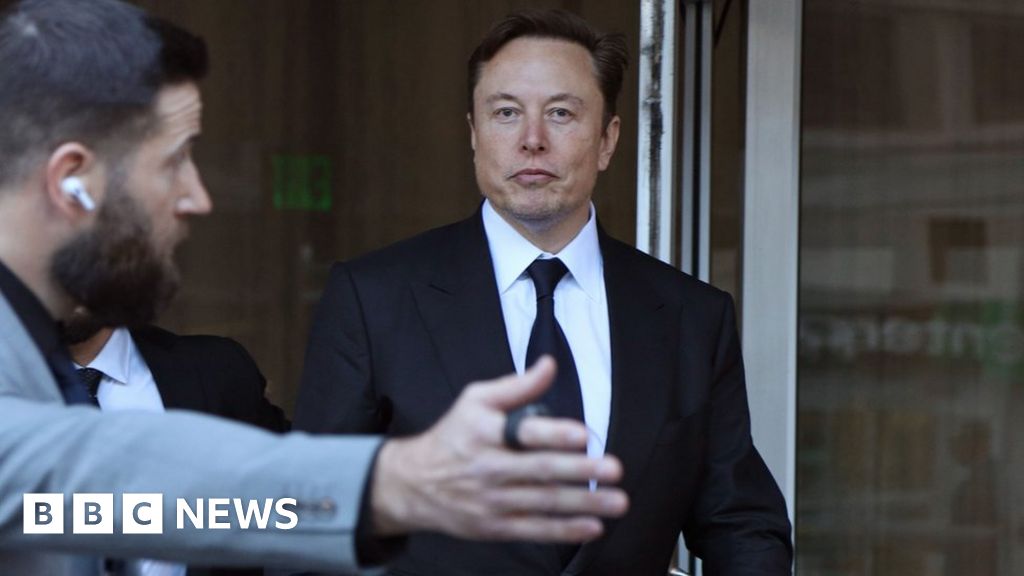 Tesla posts record profit despite price cuts
