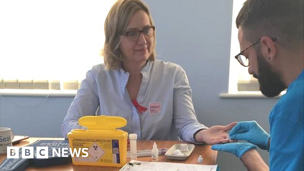 Amber Rudd takes HIV test to reduce stigma - BBC News