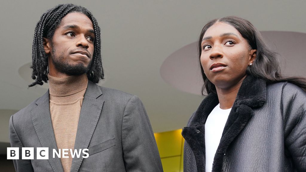 Athletes Ricardo Dos Santos and Bianca Williams outside Palestra House in central London. They are both wearing jackets and looking off-camera