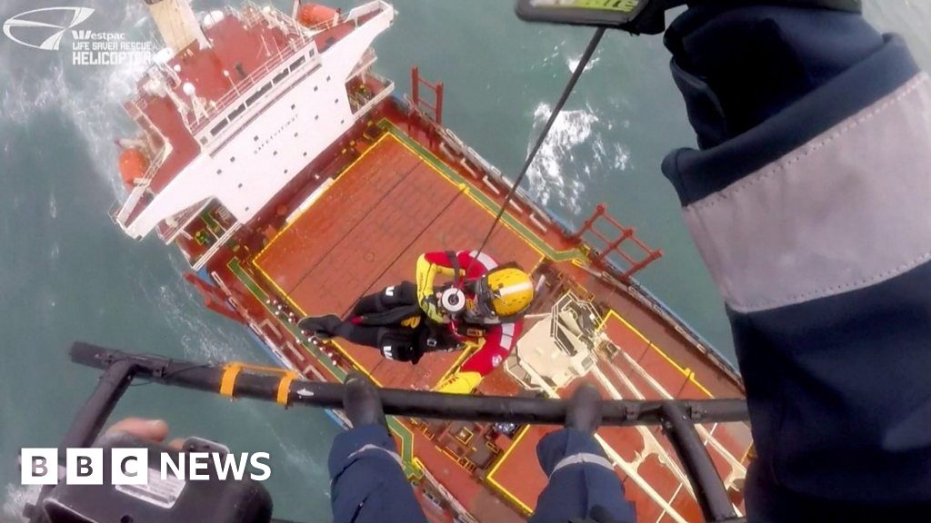 Rescuers try to save stranded cargo ship near Sydney