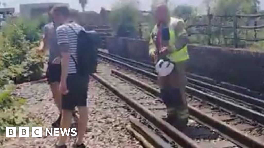 Train passengers evacuated as temperatures soar