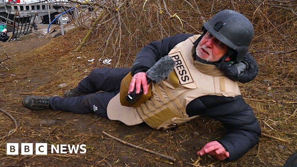 War in Ukraine: Taking cover in a town under attack