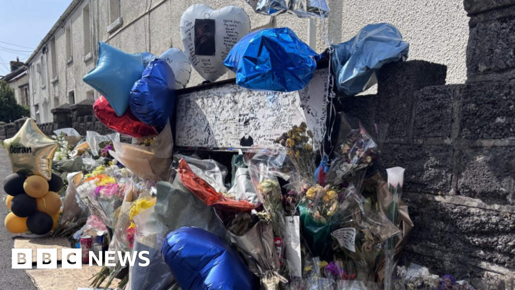 Community pay tribute to teen after murder investigation launched