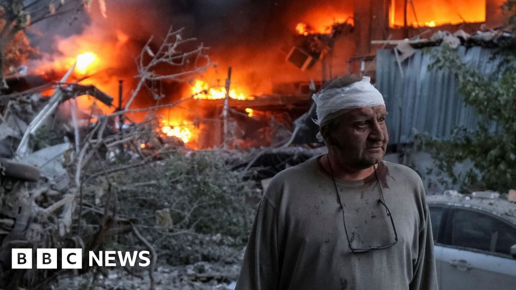 A resident stands at a site of a Russian drone and missile strike, amid Russia's attack on Ukraine, in Kyiv, Ukraine June 2, 2026.