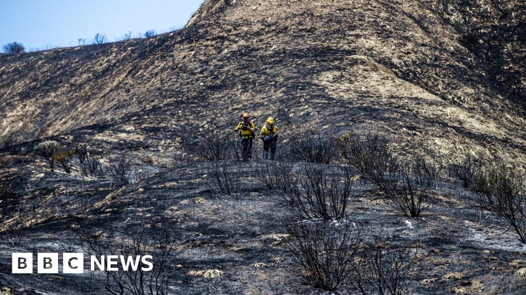 California crews battle wildfires in extreme heat