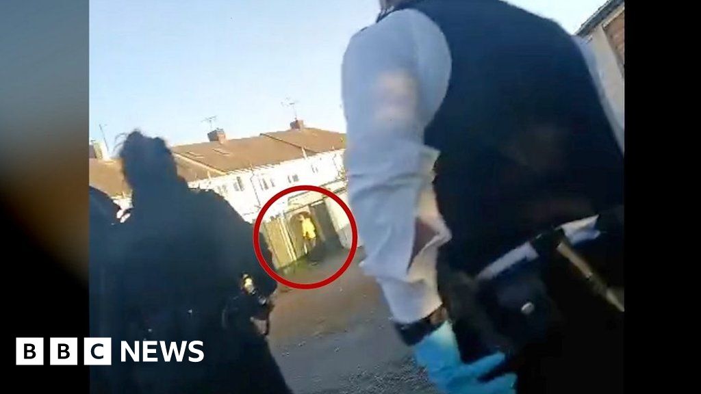 'Lock your doors' - Watch police pursue man with sword