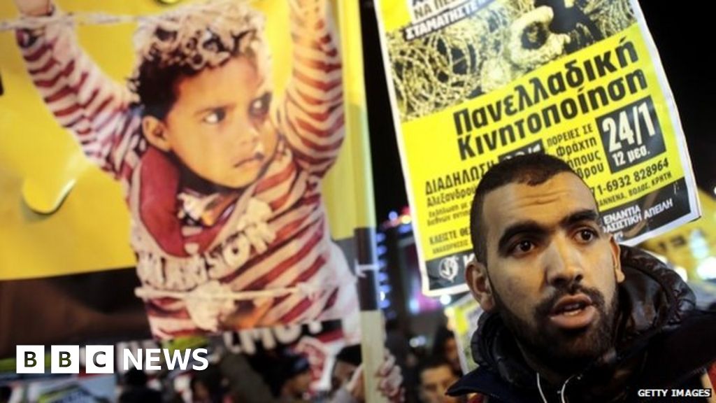 'Open the borders' rally in Athens in Greece - BBC News