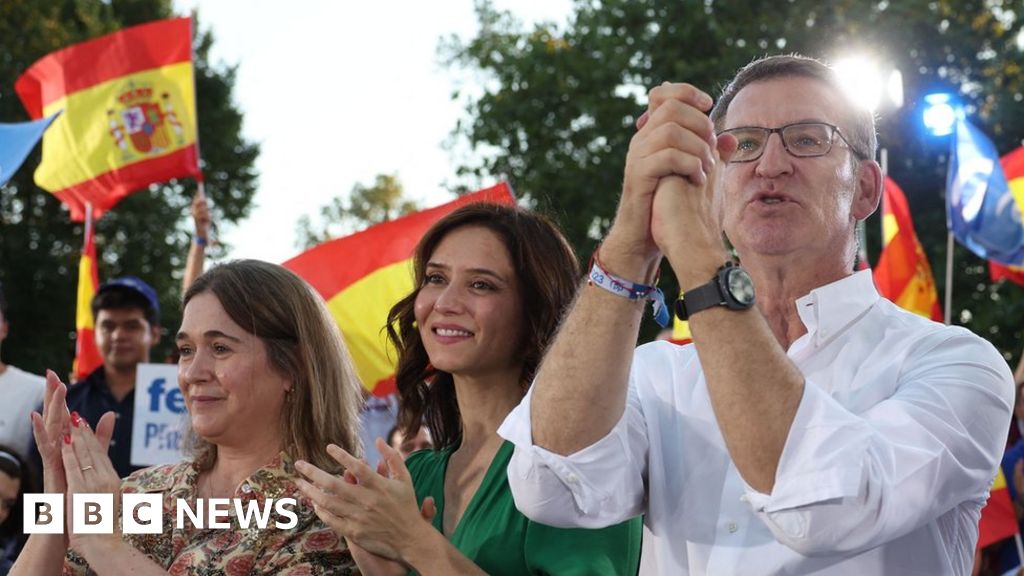 Spain faces stark left-right divide in hot summer vote