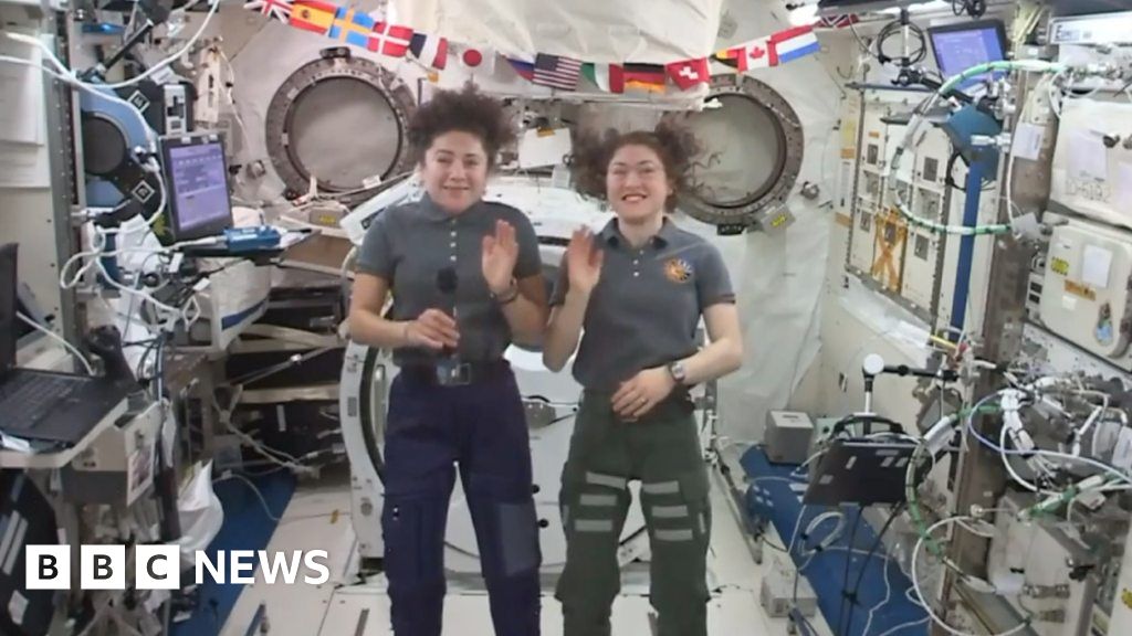 Female astronauts answer questions from orbit