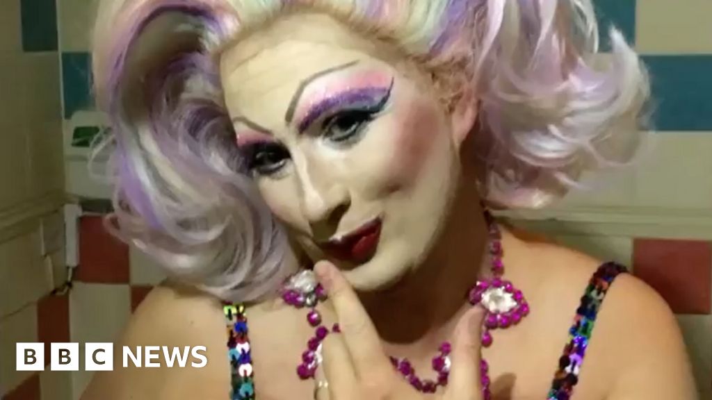 Drag queen head teacher backed by school