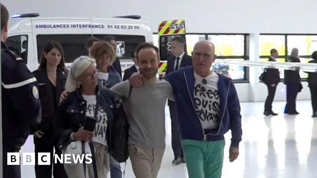 French citizen returns home freed by Iran