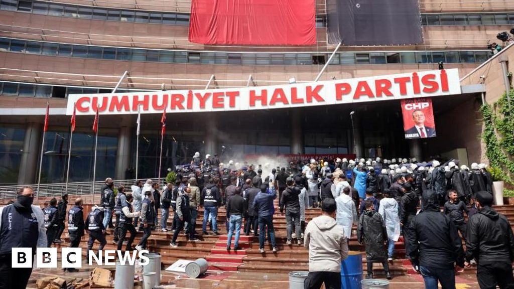 Turkish riot police storm opposition offices after leaders ousted