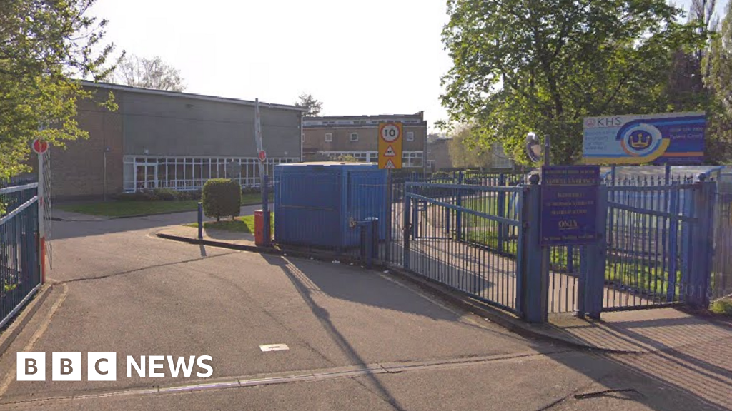 Hunt on for teen after two boys stabbed at school