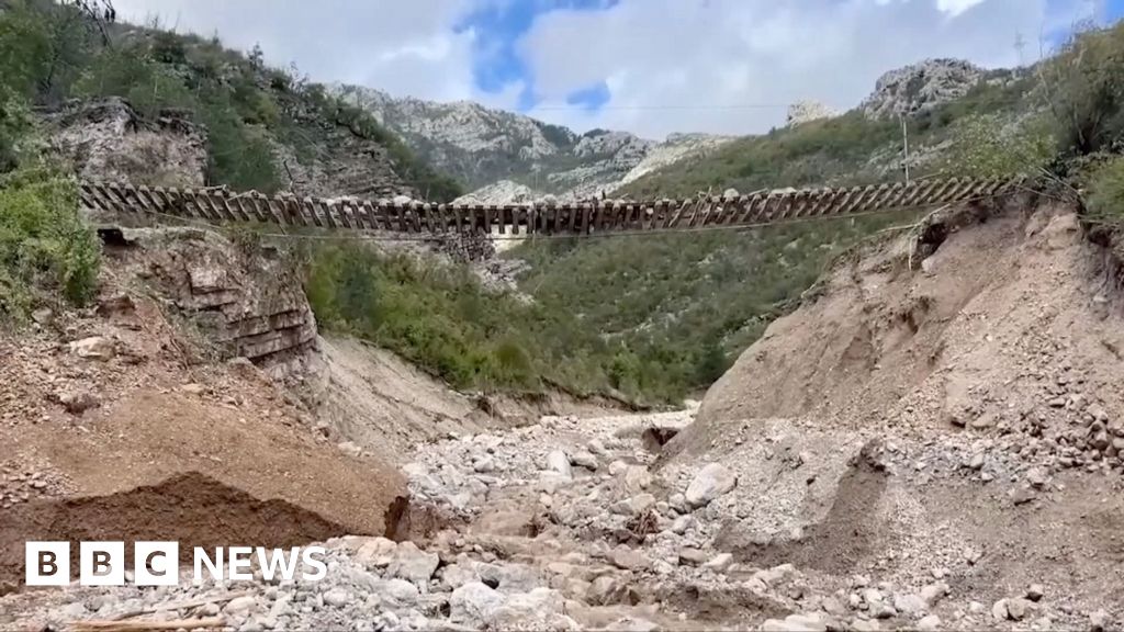 Train track left hanging in the air after Bosnia landslides