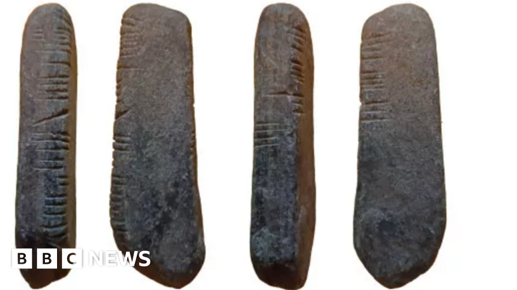 The discovery of small stone carved with an early form of Celtic script has caused excitement among archaeologists after being dug up in a garden. It 